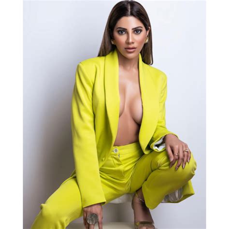 Bigg Boss 14 Fame Nikki Tamboli Poses Braless In A Blazer Takes