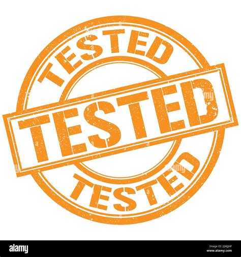 Tested Text Written On Orange Round Stamp Sign Stock Photo Alamy