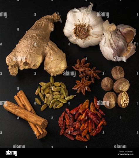 Set Of Asian Spices Cardamon Seeds Garlic Anise Stars Nutmeg