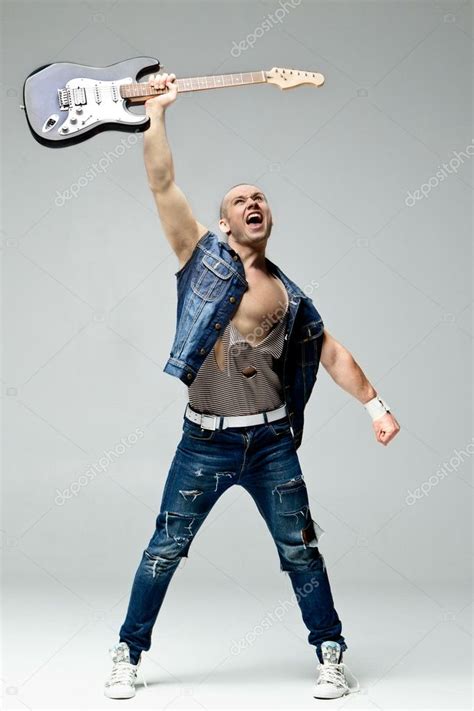 Guy Holding A Guitar Stock Photo Bezikus 10641501