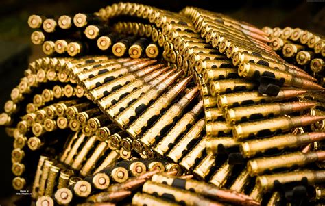 1366x768 resolution | brass-colored gun ammo HD wallpaper | Wallpaper Flare