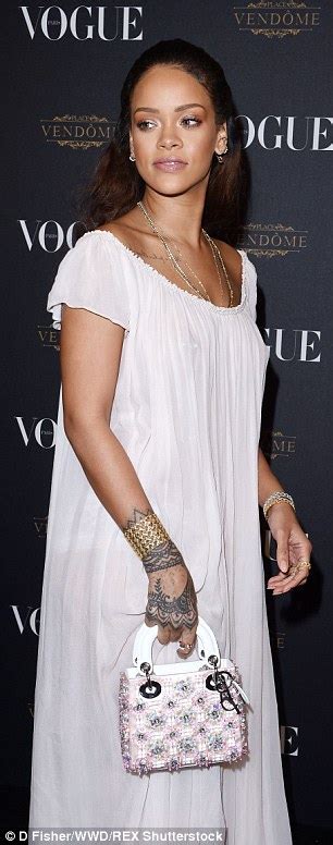 Rihanna Goes Braless In Sheer Dress At Vogue S Paris Fashion Week Party