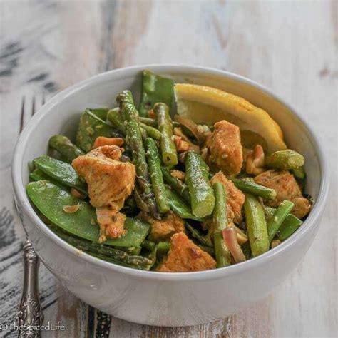 Indian Stir Fry Of Chicken With Asparagus And Snow Pea Pods The