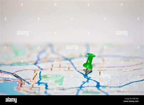 push pin in colorful map Stock Photo - Alamy