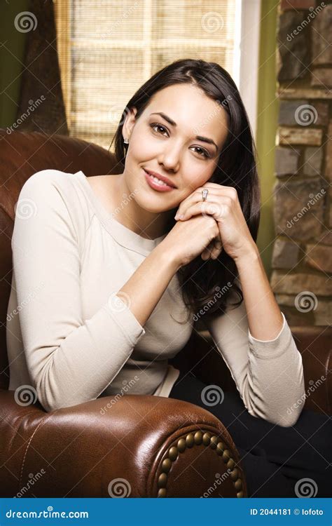 Woman Sitting In Chair Smiling Stock Image Image Of Home Leisure 2044181