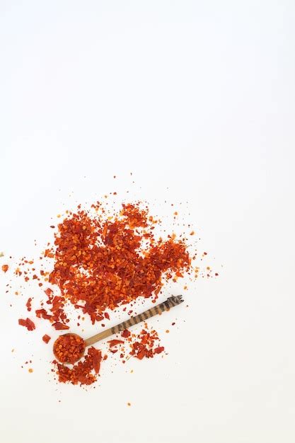 Premium Photo Red Dried Crushed Hot Chili Peppers And Chili Flakes Or