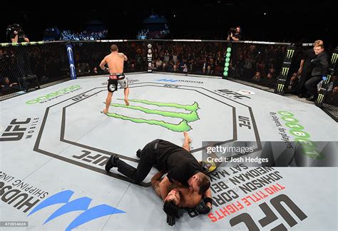 Robert Whittaker celebrates his knockout victory over Brad Tavares in ...