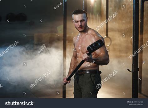 Strong Muscular Man Naked Torso Holds Stock Photo 1490152460 Shutterstock