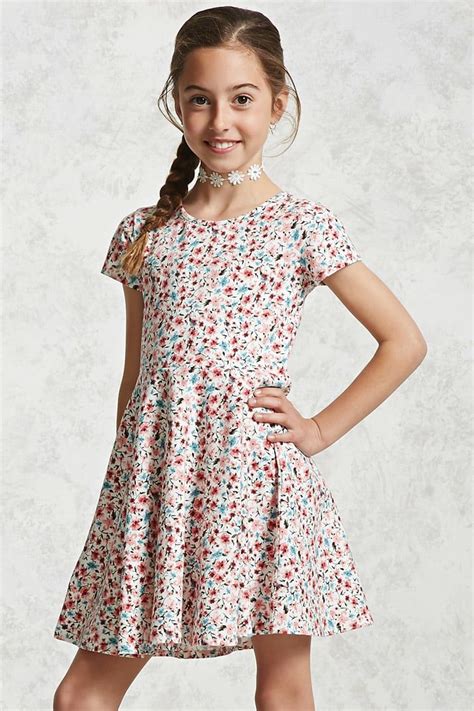 Forever 21 Girls A Stretch Knit Skater Dress Featuring An Allover Floral Print A Round