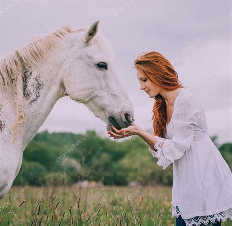 Woman Feeding White Horse ⬇ Stock Photo Image By © Amvorsuf 111773250