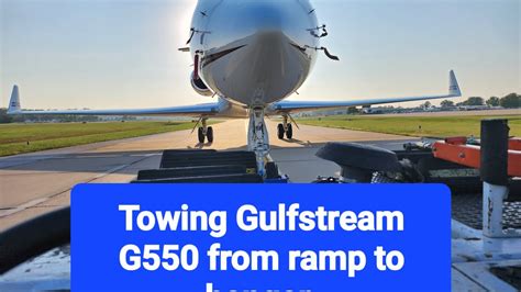 Towing Gulfstream G550 From Ramp Into Hangar Youtube