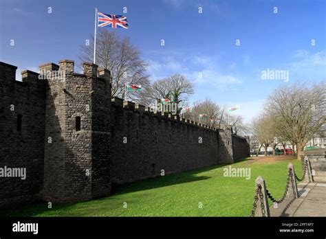 Outer Wall Of Cardiff Castle With Union Flag And Welsh Dragon Flags