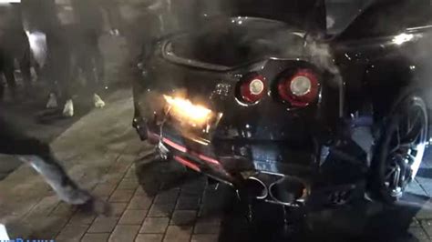 Nissan GT-R spits flames, catches on fire at London car meet