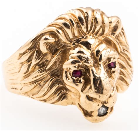 Lot Detail - 14K GOLD LION RING WITH RED TOPAZ AND DIAMOND