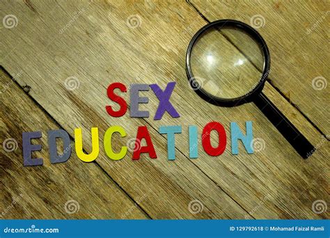 Word Sex Education Colorful Wooden Alphabet Letters Set And Magnifier On Wooden Background