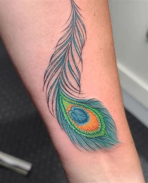 70 Best Peacock Feather Tattoo On Hand Designs 91tattoos