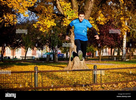 Man Jumping Over Fence In City Hi Res Stock Photography And Images Alamy