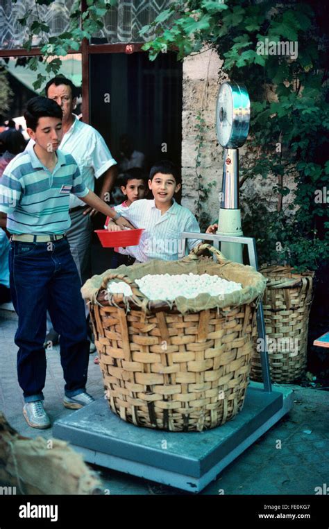 Silk Traders Weigh Bags Of Silk Cocoons At The Silk Cocoon Market Held