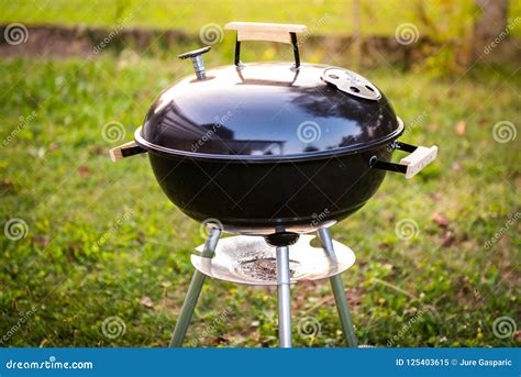 Kettle Charcoal Bbq Barbecue Grill In Garden Or Backyard Stock Image