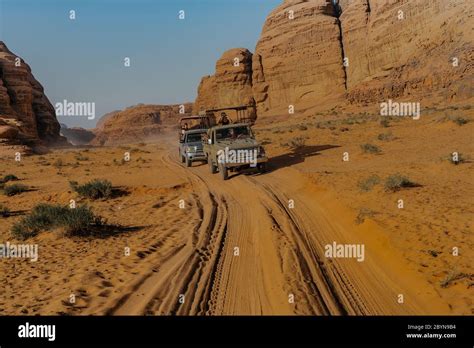 Off-road vehicle driving in desert. Driving a 4-wheel drive SUV on the ...
