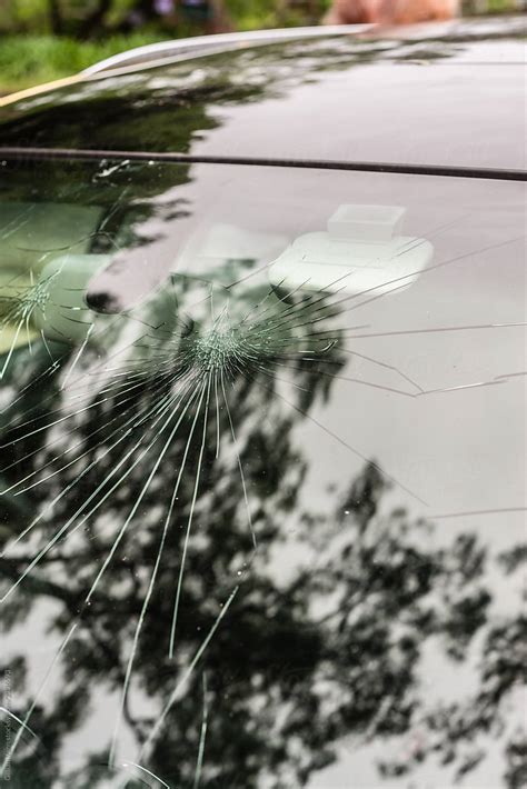 «Hail Damage On Windscreen» del colaborador de Stocksy «Gillian Vann ...