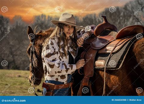 Lovely Brunette Cowgirl Enjoying A Day With Her Horse On Her Farm Stock