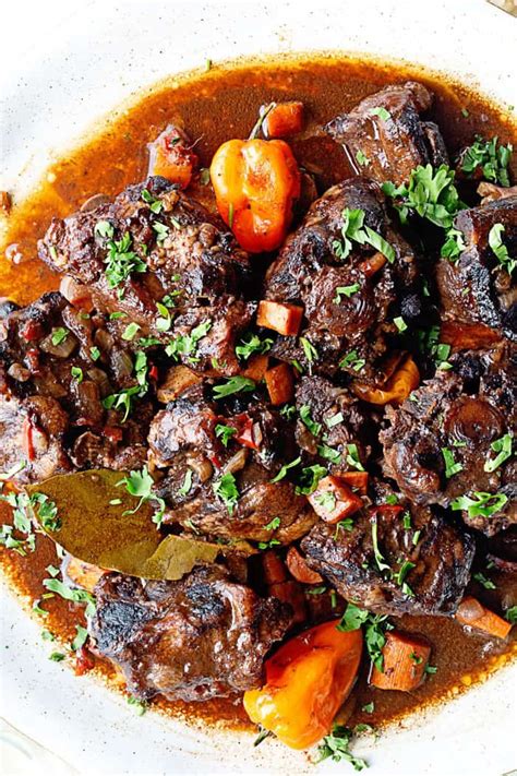 Jamaican Oxtail Recipe Delicious Braised Oxtails Stewing Over The Stove