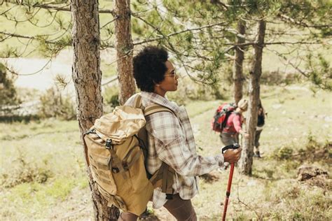 Premium Photo Mature Black Woman With Backpack Hiking On Mountains In