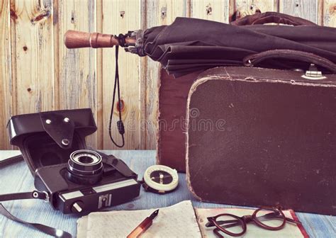 Old Suitcases and a Camera. Set Traveler Stock Photo - Image of memories, suitcase: 40375388