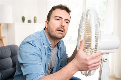 One Man Sweating Suffering Summer Heatwave At Home Stock Photo Image