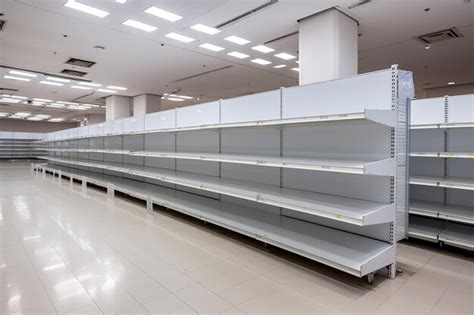 Premium Photo | Empty shelves in a supermarket due to covid