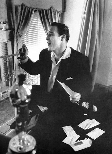 Marlon Brando at home celebrating his Oscar win for On the Waterfront ...