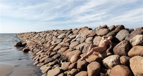 Nude Woman Posing On A Stone Pier Stock Image Image Of Pier Landscape
