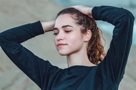 Portrait Of Cute Optimistic Woman With Blue Eyes Black And Long