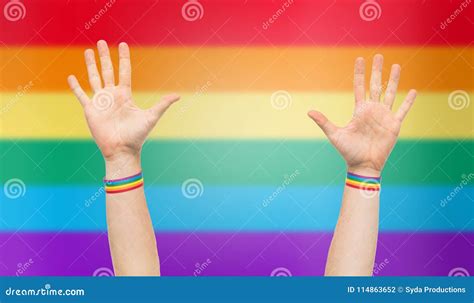 Hands With Gay Pride Rainbow Wristbands Stock Photo Image Of Gesture