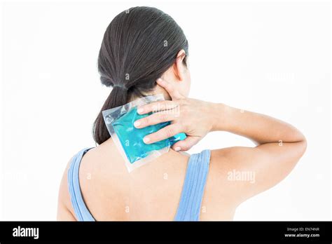 Beautiful Brunette Putting Gel Pack On Neck Stock Photo Alamy