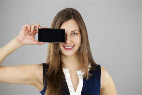 Brunette Showing Naked Breasts Posing On The Bed In The Hotel Bedroom