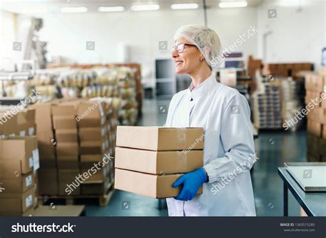 Smiling Blonde Employee Sterile Uniform Eyeglasses Stock Photo 1365515285 Shutterstock