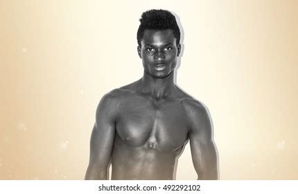 Naked Black Man Over Ocher Background Stock Photo 492292102 Shutterstock