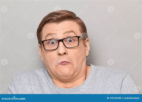 Portrait Of Confused Surprised Mature Man With Glasses Stock Image