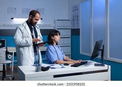 Doctor Nurse Doing Teamwork Medical Checkup Stock Photo 2101958101 ...