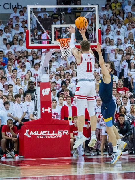 Men’s Basketball: Badgers surge in second half to defeat Holy Cross in ...