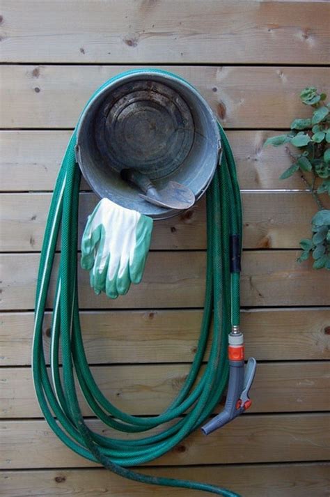 Build A Garden Hose Storage With Planter DIY Projects For Everyone