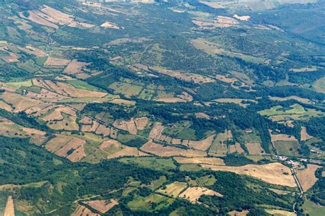 Premium Photo | Lazio region farmed fields hills aerial view