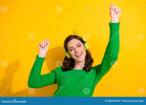 Portrait Of Youngster Woman Raised Fists Up Having Fun In Good Mood