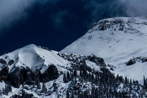 Free Images Tree Rock Snow Winter Cloud Mountain Range Weather