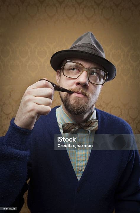 Nerdy Older Bearded Man With Pipe Thinking In Wisdom Stock Photo