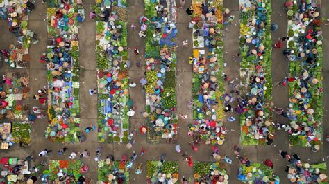 Top view of colorful local outdoor farmers market in rural Vietnam