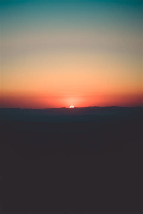 Silhouette of Mountain during Sunset · Free Stock Photo