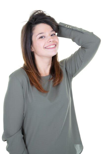 Joven Mujer Feliz Sonriendo Y Pensando En El Fondo Blanco Mirando A La